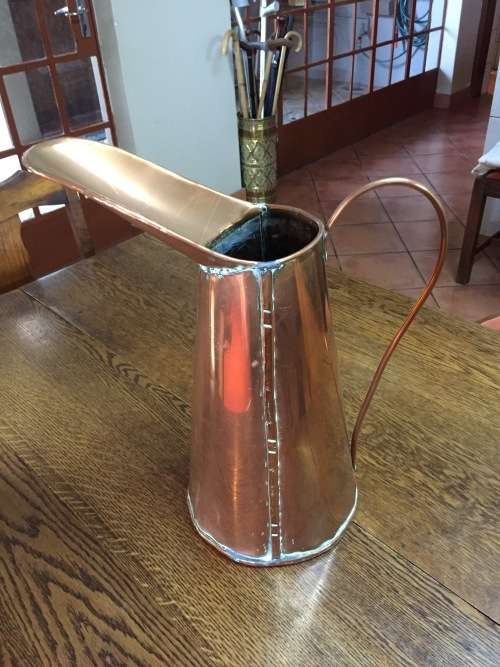 Large solid copper jug with copper handle